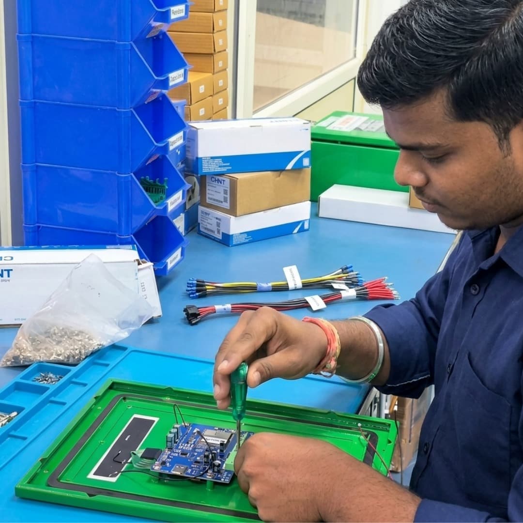 Solar controller assembly line — circuit boards, clean room, workers in anti-static gear